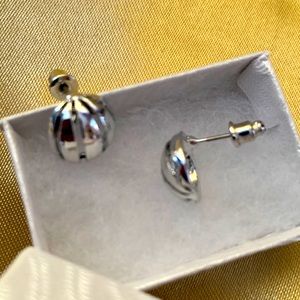 One pair Earrings new in box, Stainless polished half dome shape. 2/$10, 3/$12
